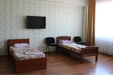 Фото номера Стандартный четырехместный номер Отели типа «постель и завтрак» Hotel Tourist г. Павлодар 5
