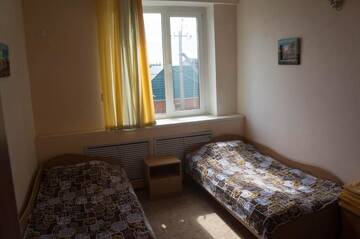 Фото номера Двухместный номер с 2 отдельными кроватями Мотели Sapsan Motel г. Павлодар 9